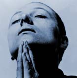 Joan of Arc prays in the 1937 silent film