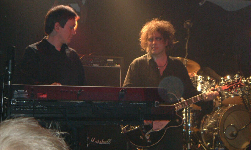 Roger and Robert share a moment  : )  (Dec. 11th, 2003)