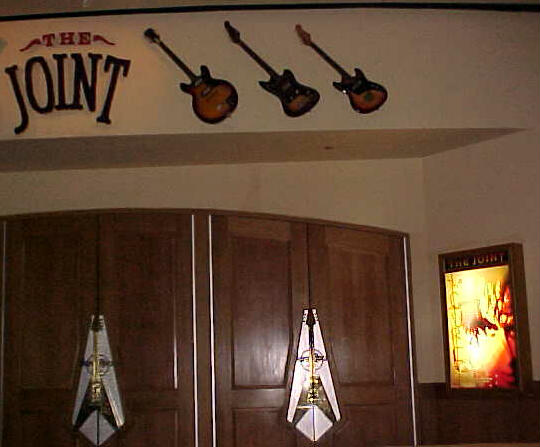 Joint entrance with Cure poster to the right
